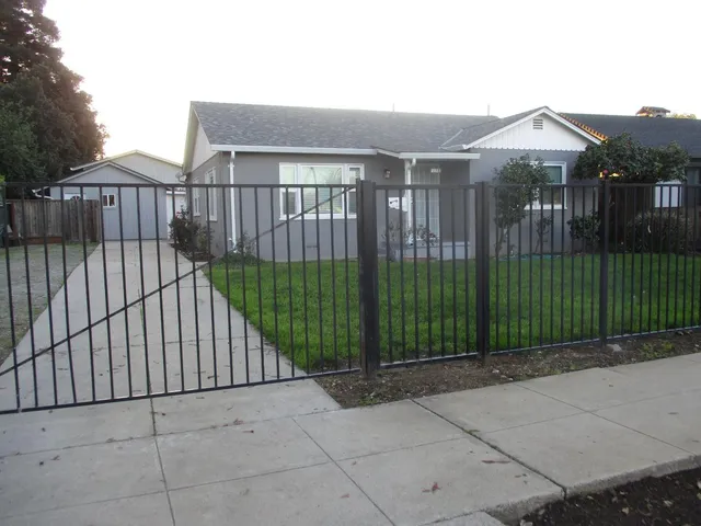 a view of a backyard with a garden