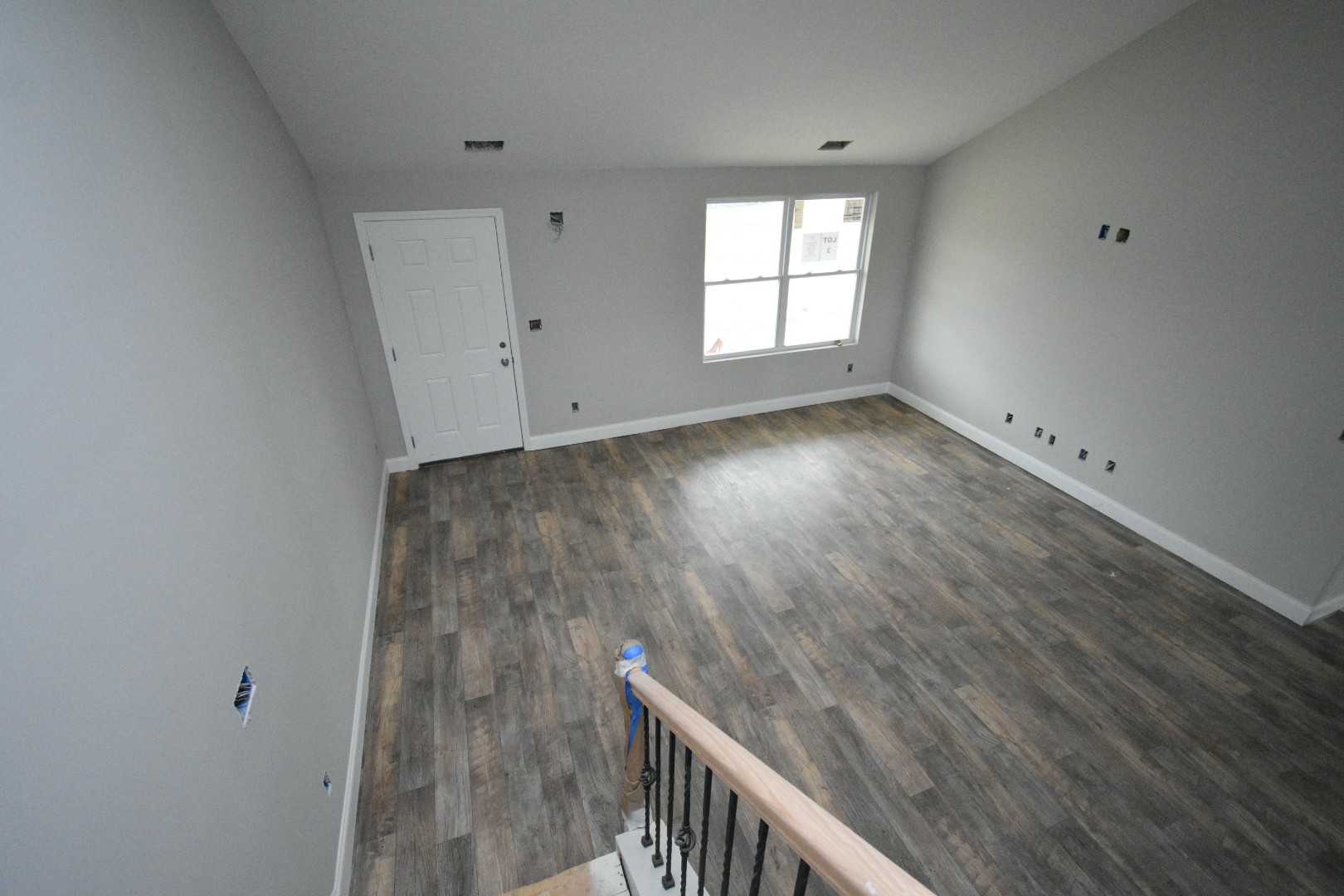 1005 East Piney Road Dickson, TN 37055 - Photo 23 of 23 an empty room with wooden floor and windows
