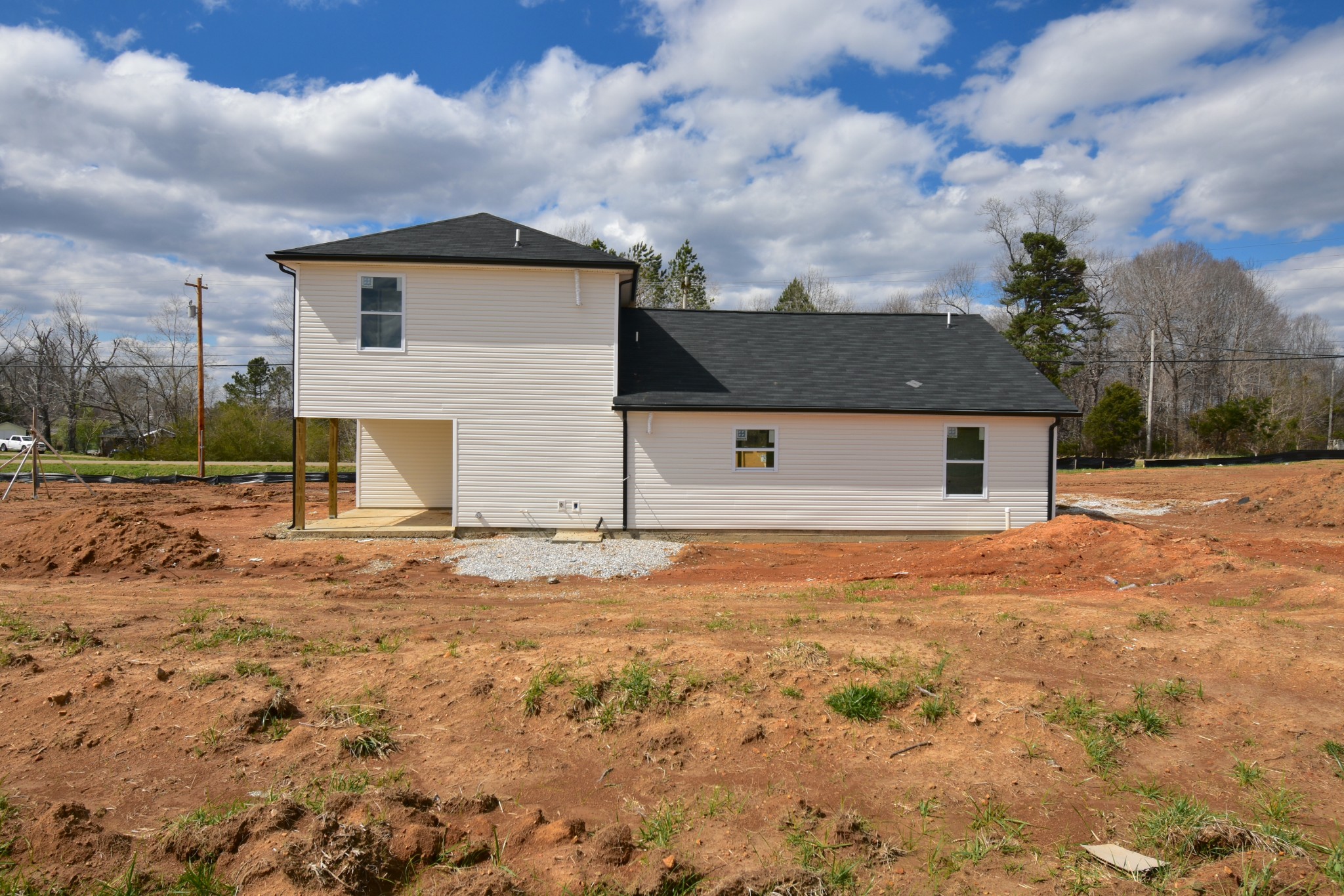 1005 East Piney Road Dickson, TN 37055 - Photo 3 of 23 a house with yard in front of it