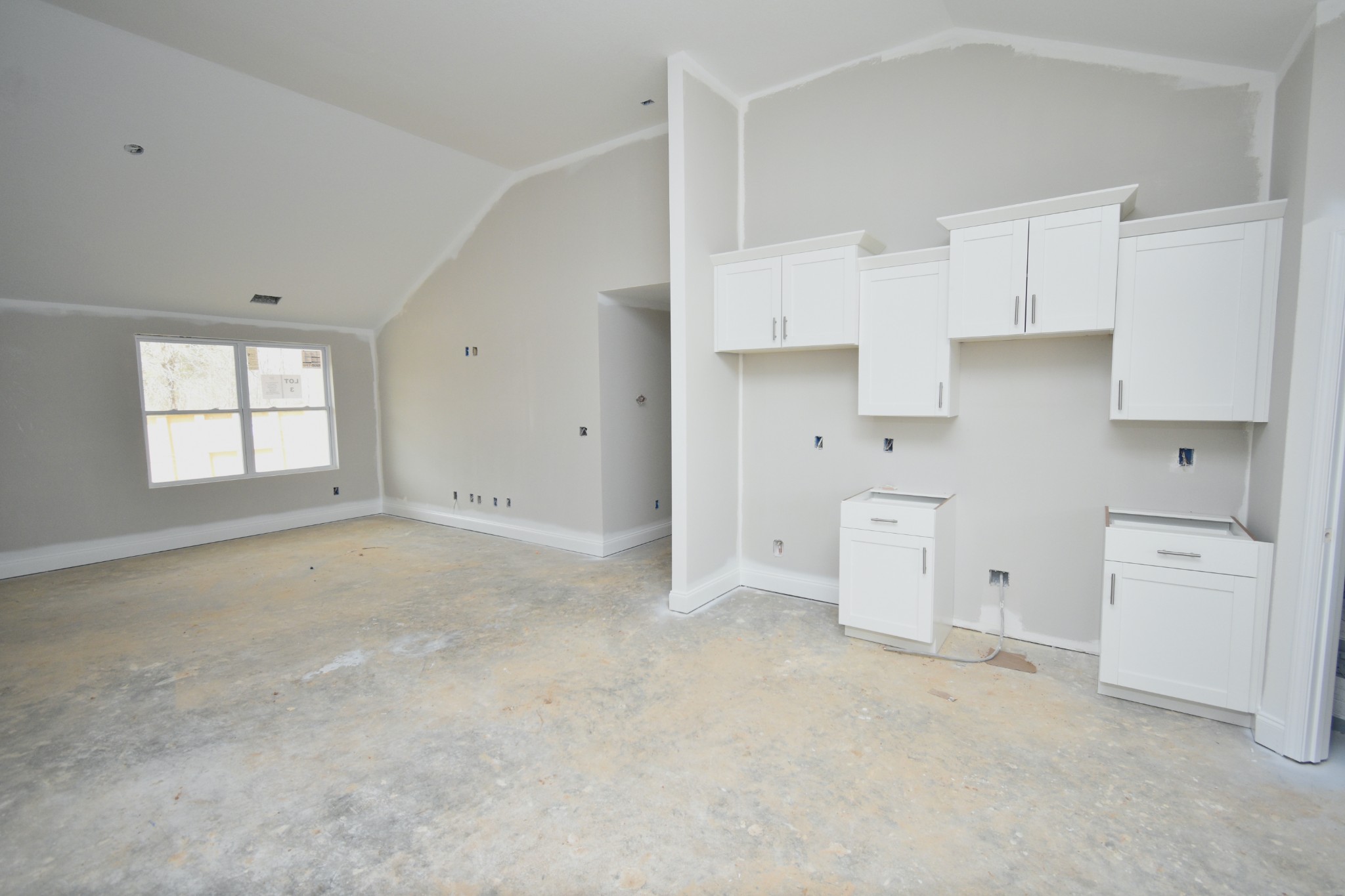 1005 East Piney Road Dickson, TN 37055 - Photo 9 of 23 a view of a kitchen with white cabinets appliances and a window
