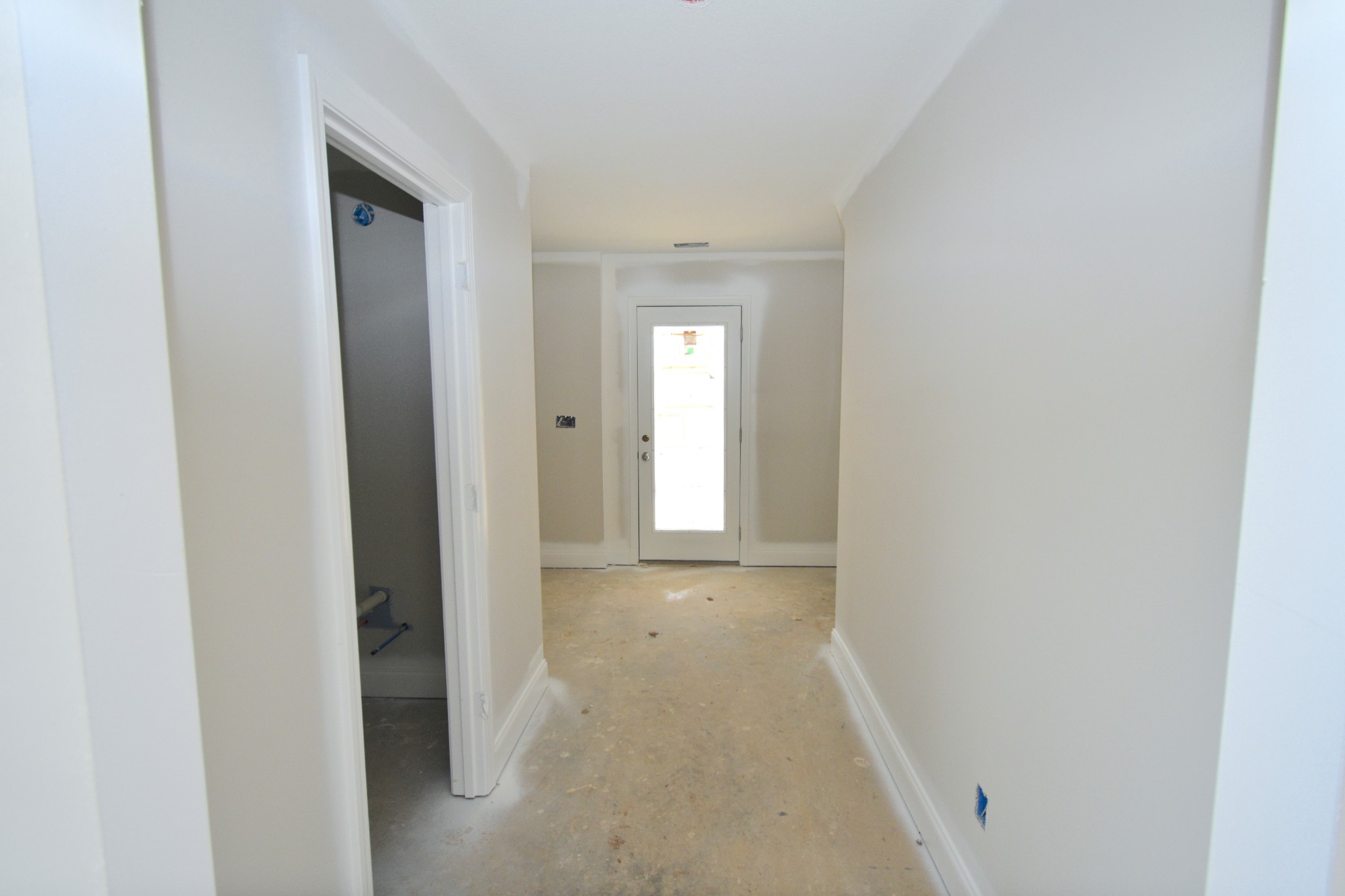1005 East Piney Road Dickson, TN 37055 - Photo 10 of 23 a view of a hallway to an empty room with wooden floor