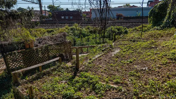 a view of a wooden fence