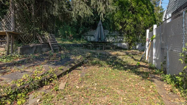 a view of backyard with green space