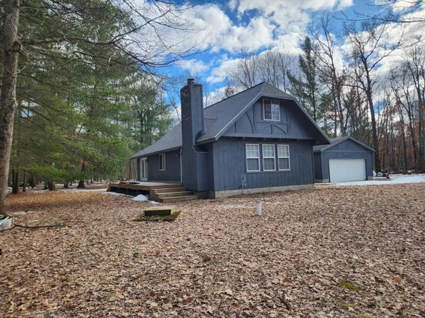 $279,900 | 1041 Wolf Lake Drive, Baldwin, MI 49304
