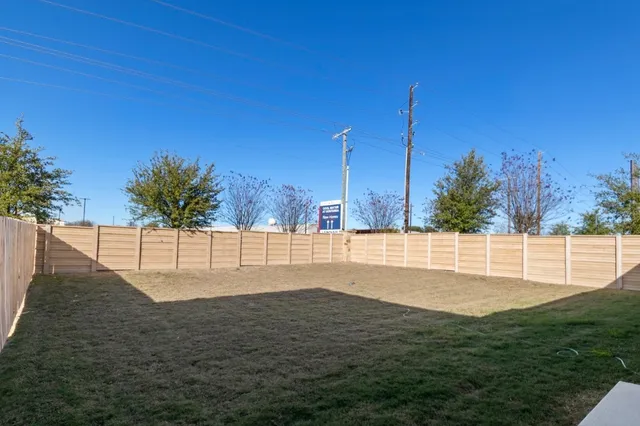 a bathroom with a double vanity sink mirror and shower
