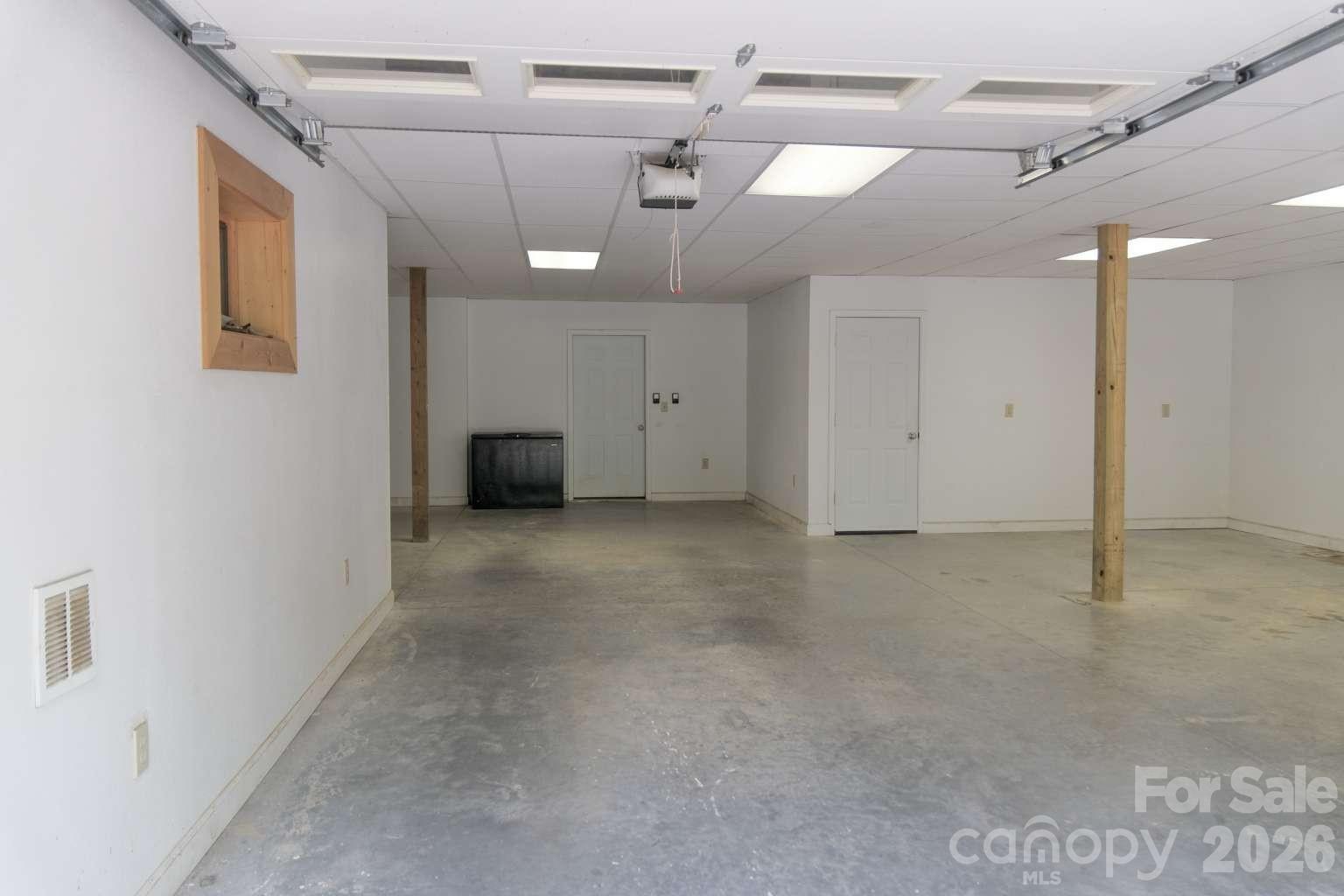 3815 Bat Cave Road Old Fort, NC 28762 - Photo 33 of 45 a view of a livingroom with a ceiling fan