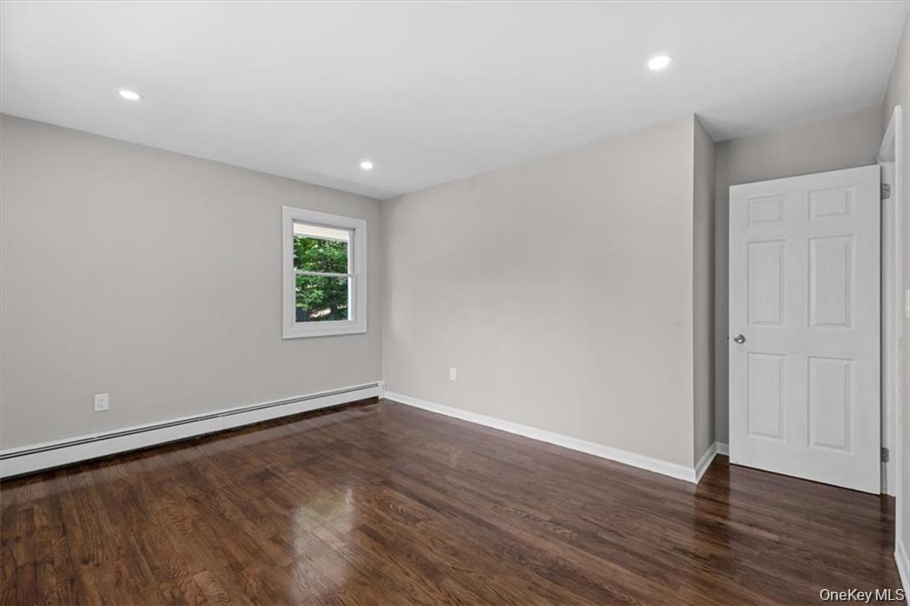 54 Brothers Road Poughquag, NY 12570 - Photo 14 of 18 a view of an empty room with wooden floor and a window