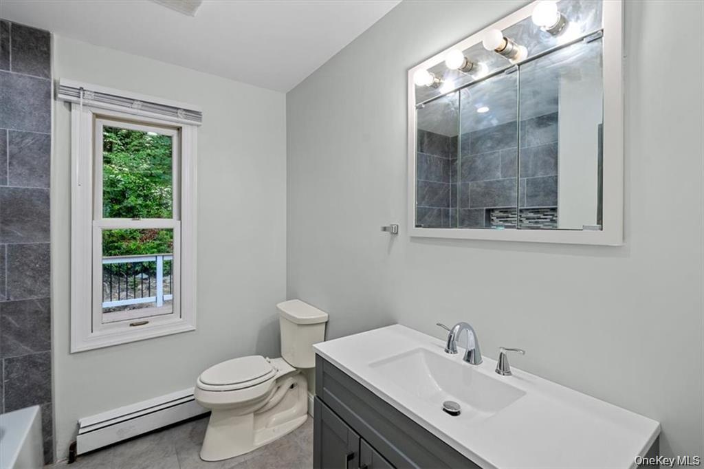 54 Brothers Road Poughquag, NY 12570 - Photo 16 of 18 a bathroom with a sink vanity mirror and toilet