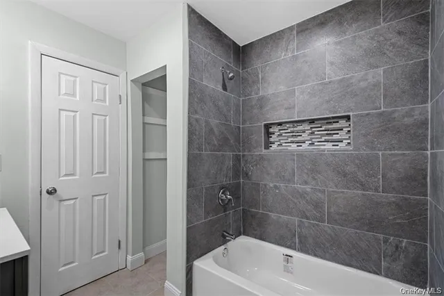 a bathroom with a bathtub