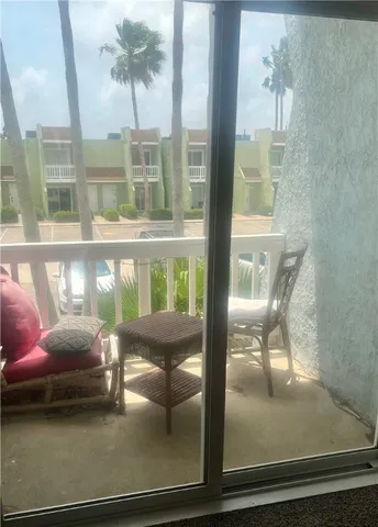 a room with furniture and a window