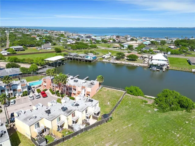 a view of a lake with a city