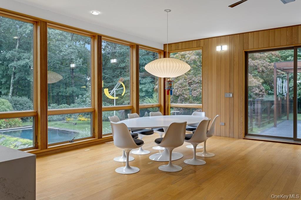 14 Cradle Rock Road East Pound Ridge, NY 10576 - Photo 5 of 34 Breakfast, lunch and dinner? Lovely, spacious area w/glass doors to covered pergola w/electric shades.