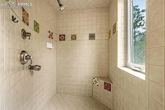 a view of a hallway with washer and dryer
