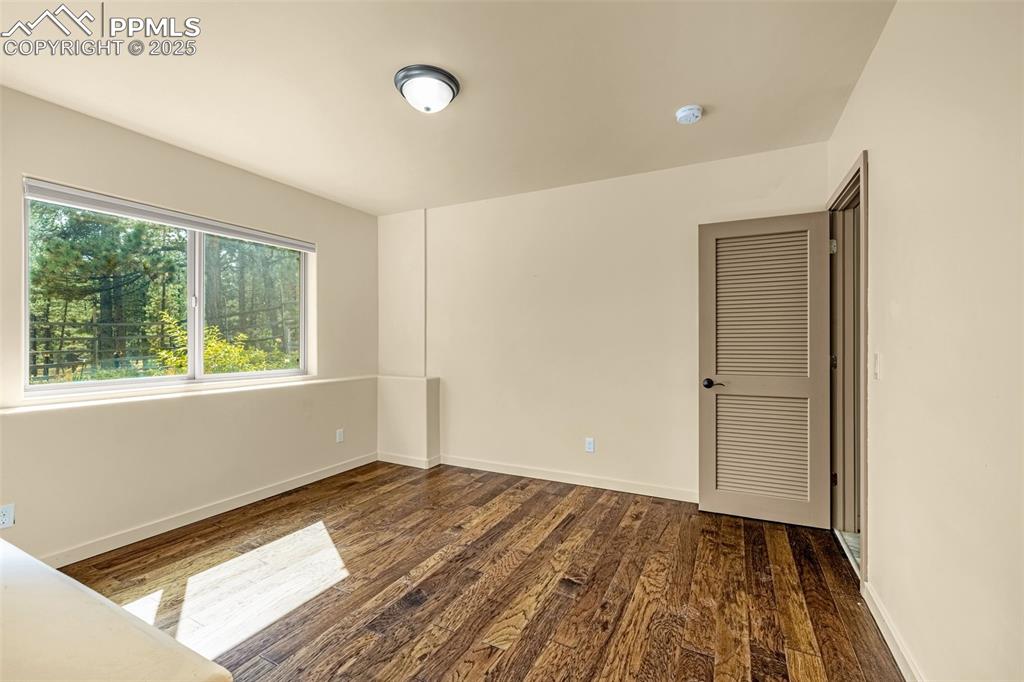 9890 Hardy Road Colorado Springs, CO 80908 - Photo 29 of 41 a view of an empty room and window