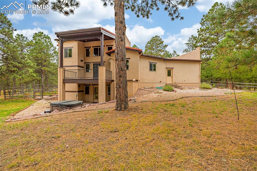9890 Hardy Road Colorado Springs, CO 80908 - Photo 35 of 41 a view of a house with a yard
