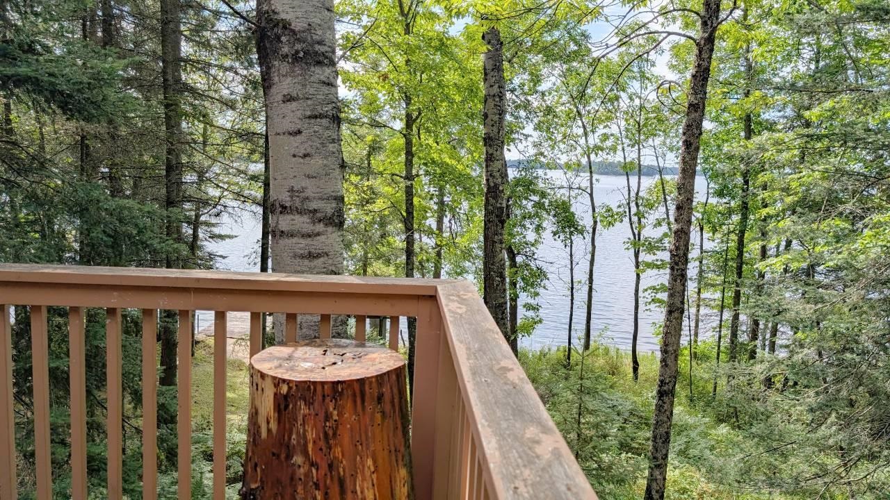 8884 Raps Road Cook, MN 55723 - Photo 35 of 46 Deck with a water view