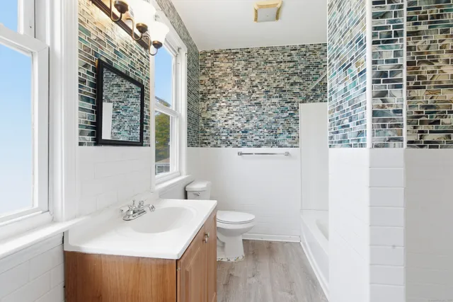 a view of a room that has a window in it