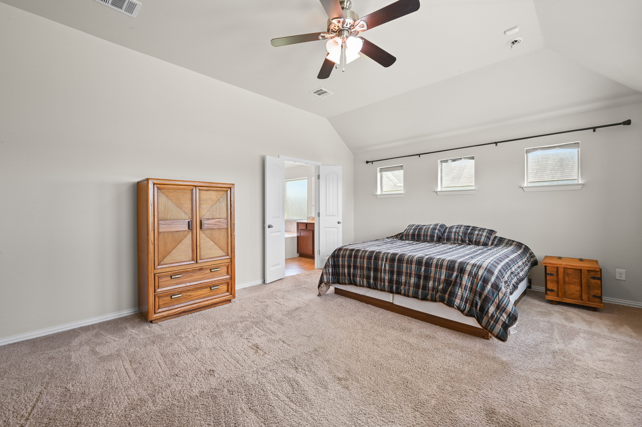 877 Hot Spring Valley Buda, TX 78610 - Photo 17 of 36 a bedroom with a bed and window
