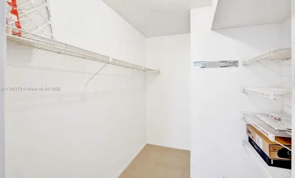 a room with furniture and a window