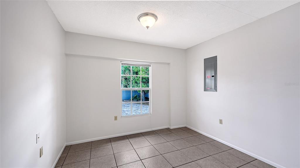 619 Albee Farm Road North Nokomis, FL 34275 - Photo 34 of 93 a view of an empty room with a window