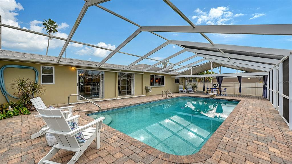 619 Albee Farm Road North Nokomis, FL 34275 - Photo 54 of 93 a view of a porch with furniture and garden
