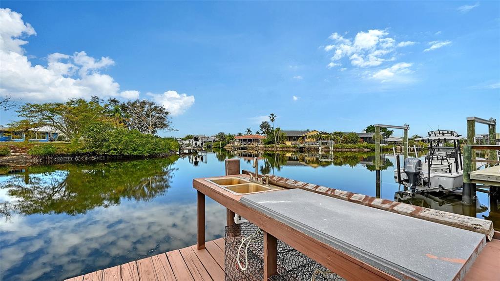 619 Albee Farm Road North Nokomis, FL 34275 - Photo 68 of 93 a view of a lake with a city view