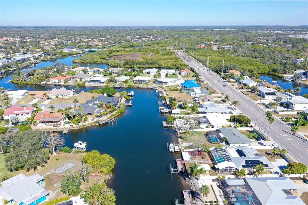 619 Albee Farm Road North Nokomis, FL 34275 - Photo 81 of 93 an aerial view of residential houses with outdoor space