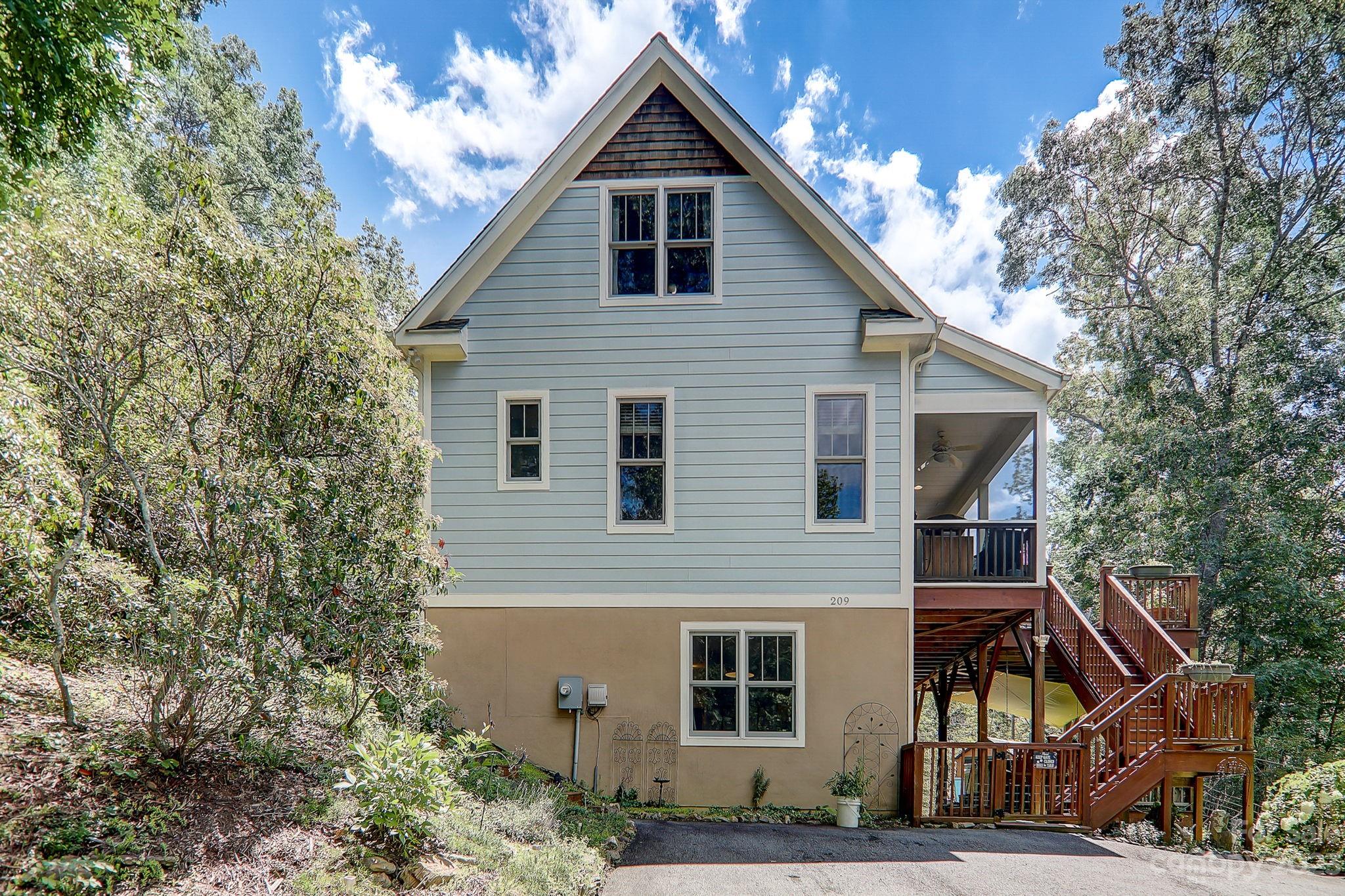 209 Whitaker Road Fairview, NC 28730 - Photo 30 of 44 a view of a house front of house