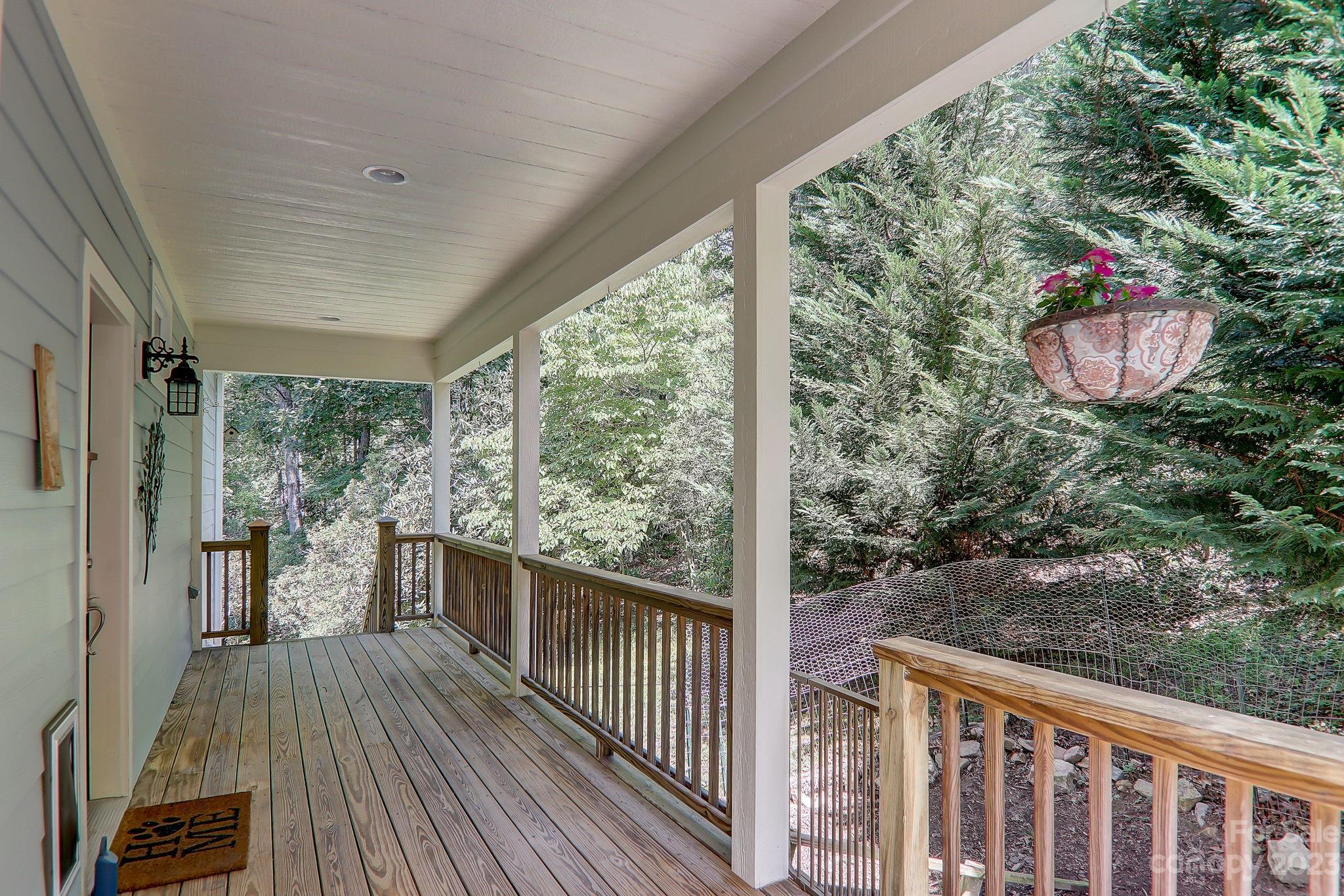 209 Whitaker Road Fairview, NC 28730 - Photo 33 of 44 a view of a balcony with wooden floor