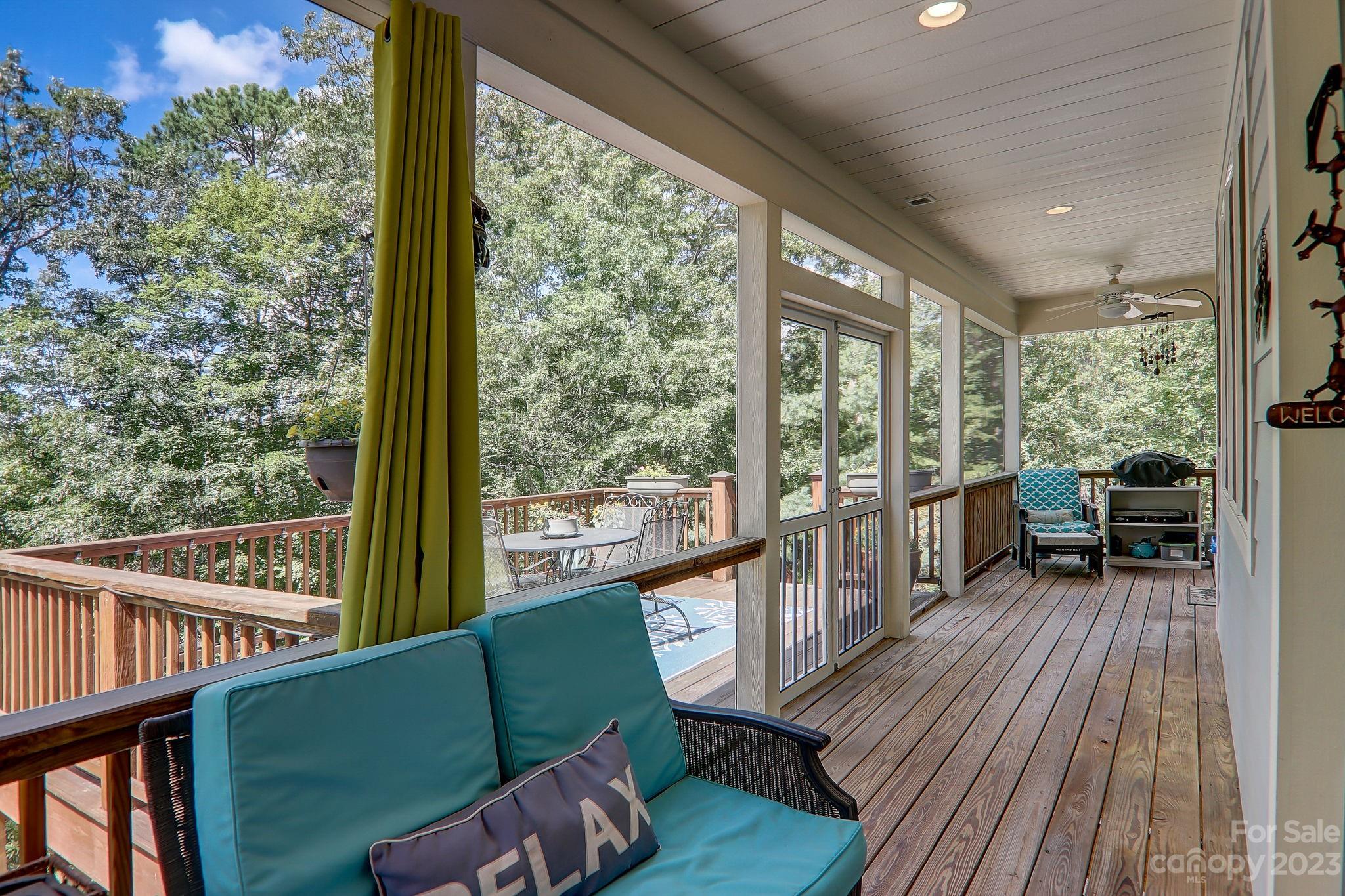 209 Whitaker Road Fairview, NC 28730 - Photo 36 of 44 a view of two chairs in a balcony