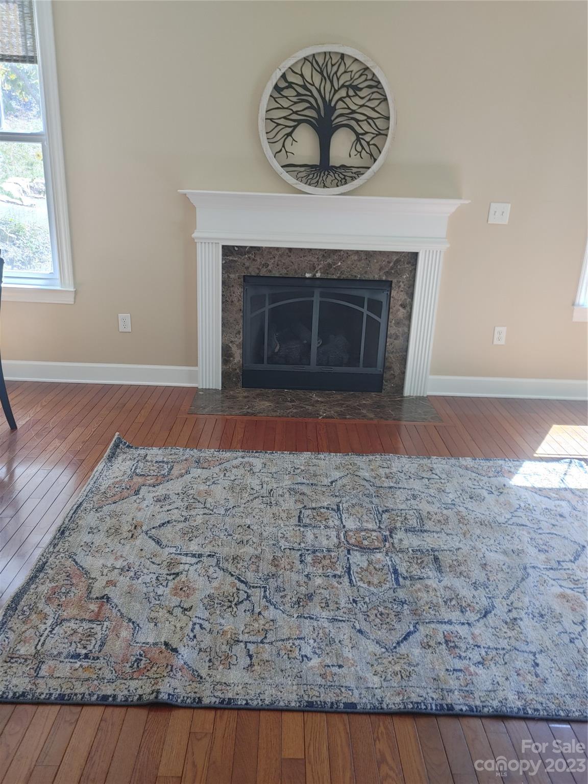 209 Whitaker Road Fairview, NC 28730 - Photo 44 of 44 a view of wooden floor has a fireplace