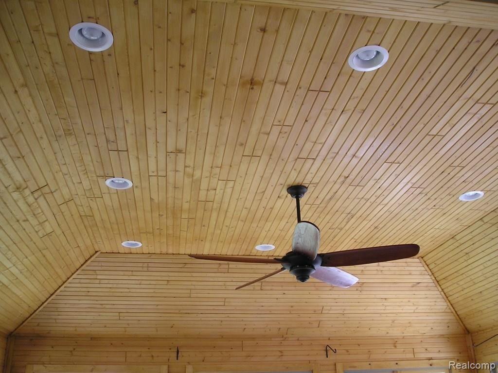 4025 Belle Ridge Drive Dryden, MI 48428 - Photo 26 of 43 Viewed of knotty pined panned ceiling in the sun room. Entire room is solid knotty pine, not paneling.