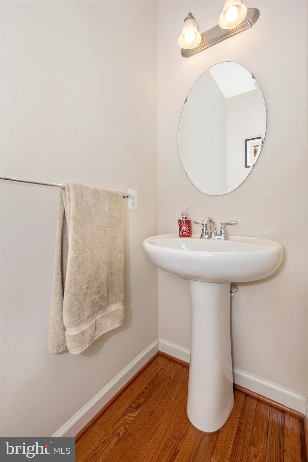 9121 Bealls Farm Road Frederick, MD 21704 - Photo 22 of 63 a bathroom with a sink a mirror and a toilet