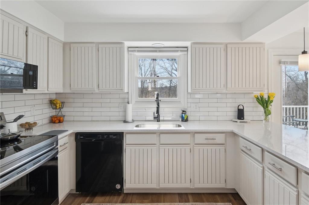 412 Chandler Place Pittsburgh, PA 15212 - Photo 12 of 38 a kitchen with a sink cabinets and window