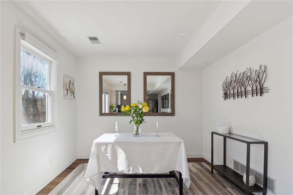 412 Chandler Place Pittsburgh, PA 15212 - Photo 15 of 38 a living room with furniture and a table