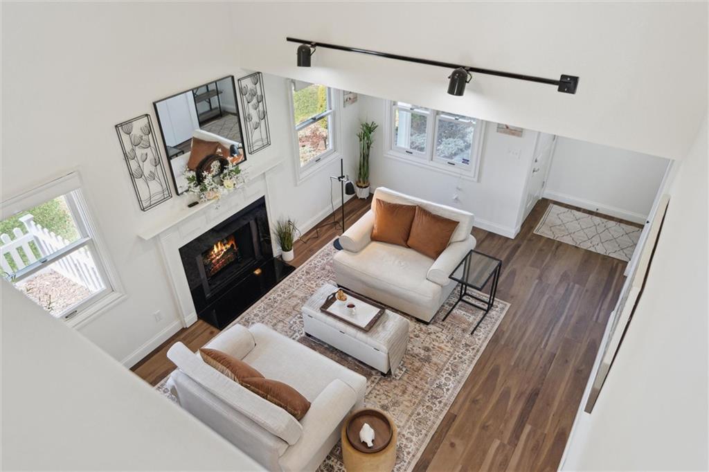 412 Chandler Place Pittsburgh, PA 15212 - Photo 19 of 38 a living room with furniture and a fireplace