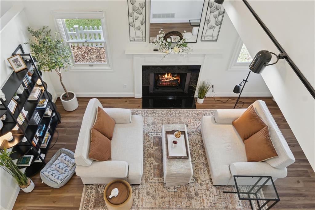 412 Chandler Place Pittsburgh, PA 15212 - Photo 20 of 38 a living room with furniture and a fireplace