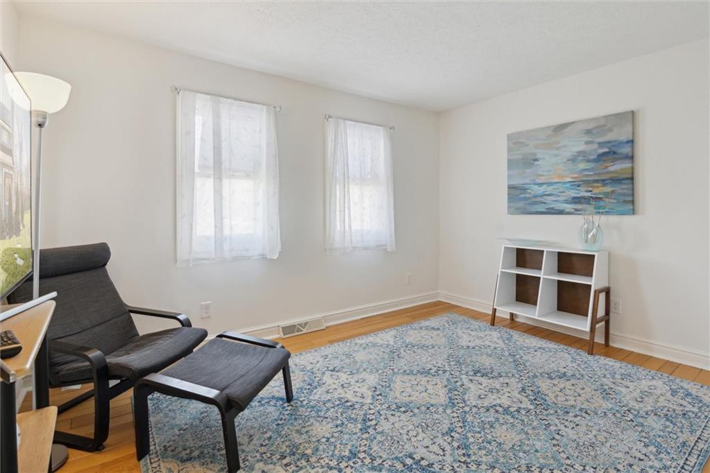 412 Chandler Place Pittsburgh, PA 15212 - Photo 24 of 38 a view of workspace room with wooden floor and windows
