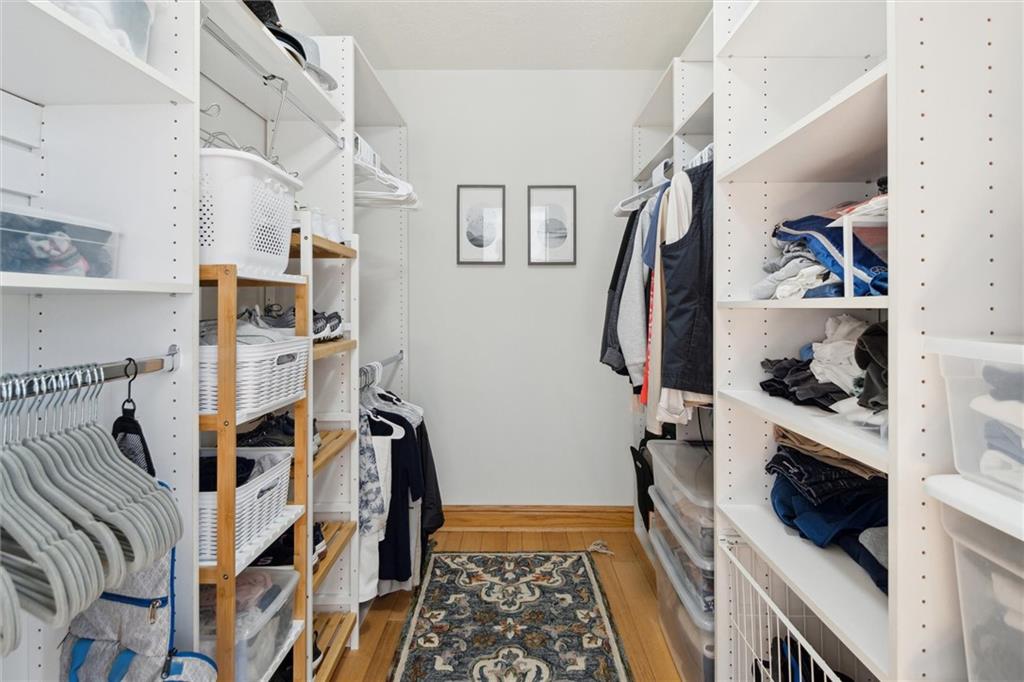 412 Chandler Place Pittsburgh, PA 15212 - Photo 29 of 38 a view of walk in closet with clothes and shoes