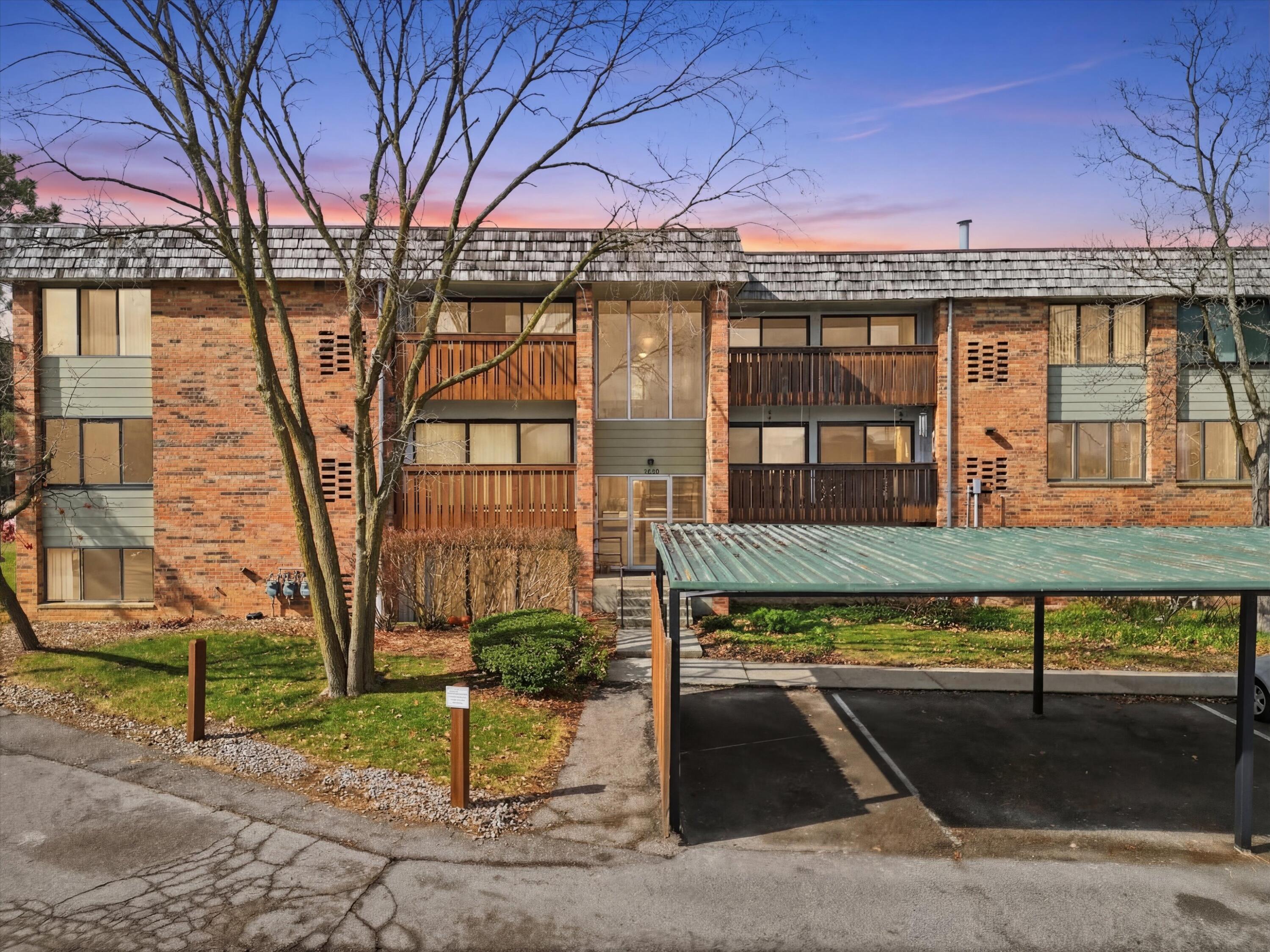 1265 South Maple Road, Unit 206 Ann Arbor, MI 48103 - Photo 4 of 52 01-DJI_0005_twilight_66ceedce-62ab-488d-