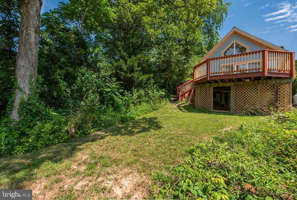 740 Powhatan Beach Road Pasadena, MD 21122 - Photo 1 of 39 From the water, looks like a mountain lake home