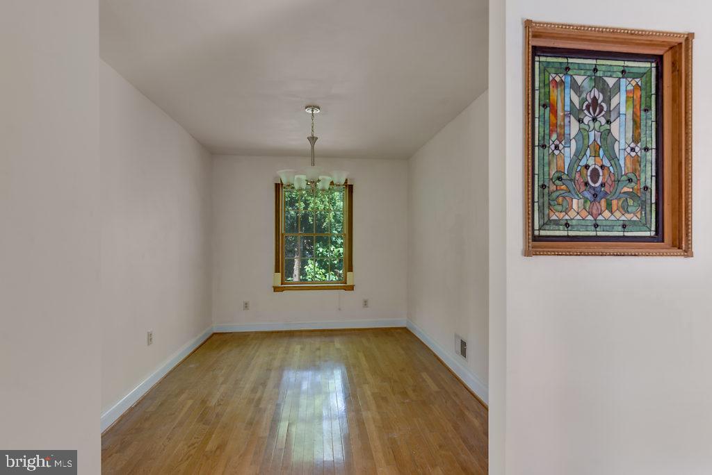 740 Powhatan Beach Road Pasadena, MD 21122 - Photo 16 of 39 Separate dining room, stain glass