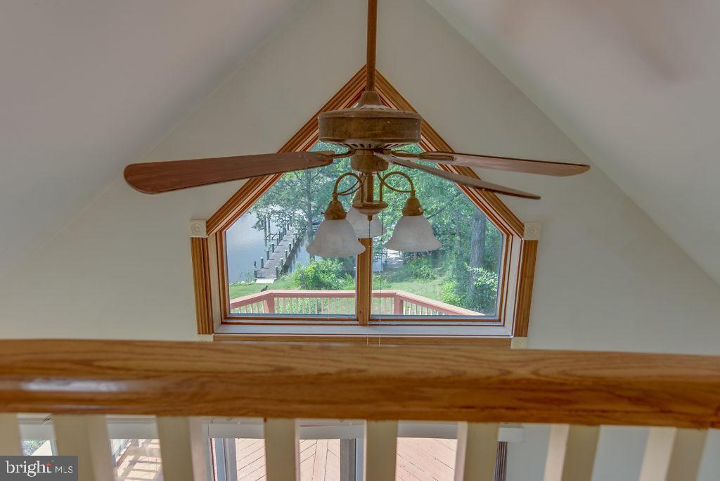 740 Powhatan Beach Road Pasadena, MD 21122 - Photo 27 of 39 View from loft overlooking sun room