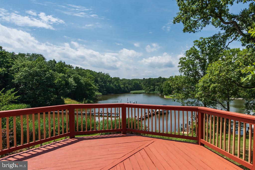 740 Powhatan Beach Road Pasadena, MD 21122 - Photo 10 of 39 Large deck off of the living room