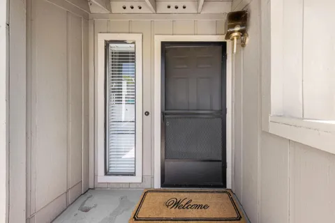 a view of entryway with a door