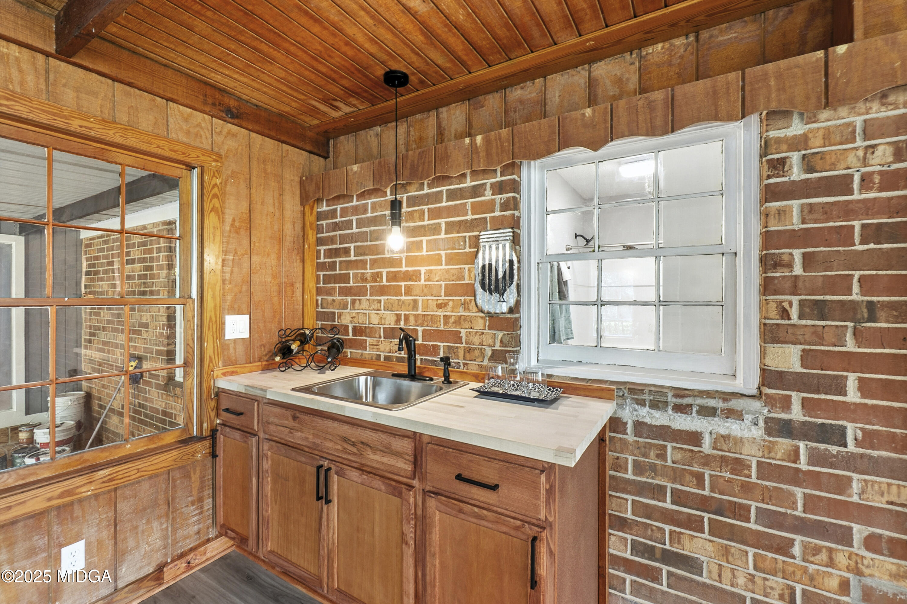 109 Scarborough Road Centerville, GA 31028 - Photo 36 of 52 a kitchen with a sink and a window