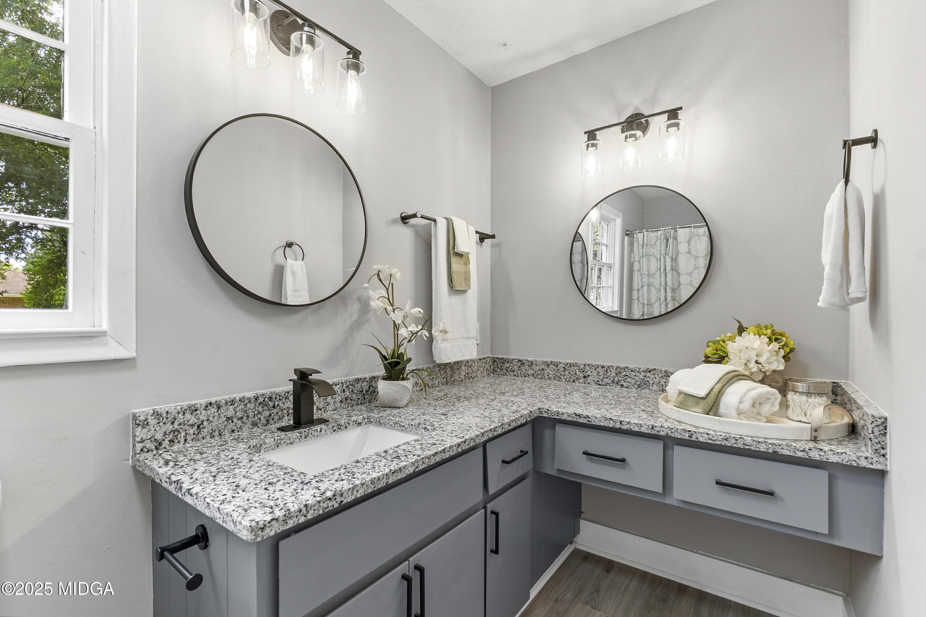 109 Scarborough Road Centerville, GA 31028 - Photo 39 of 52 a bathroom with a granite countertop sink and a mirror