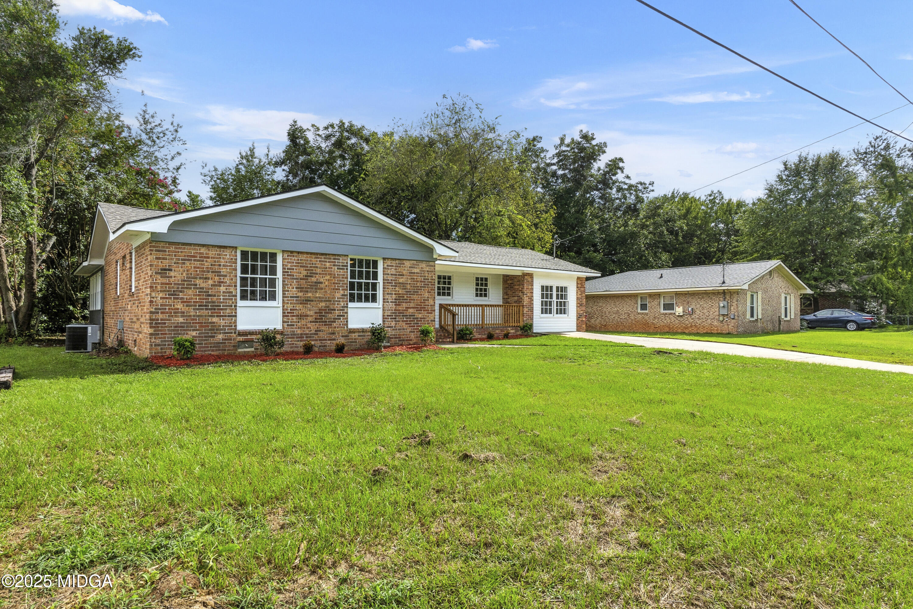 109 Scarborough Road Centerville, GA 31028 - Photo 51 of 52 a front view of a house with a garden
