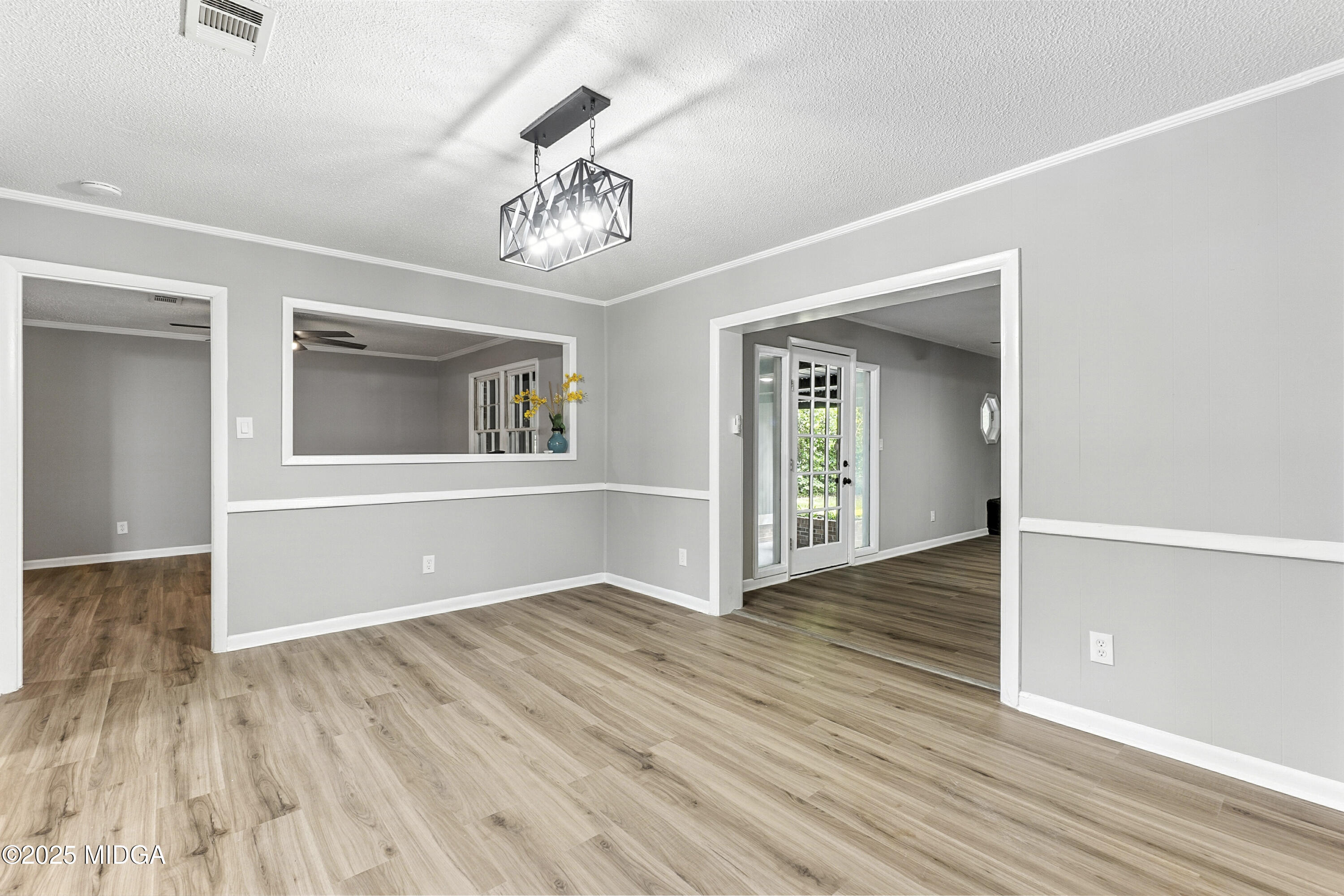 109 Scarborough Road Centerville, GA 31028 - Photo 8 of 52 wooden floor in an empty room with a window