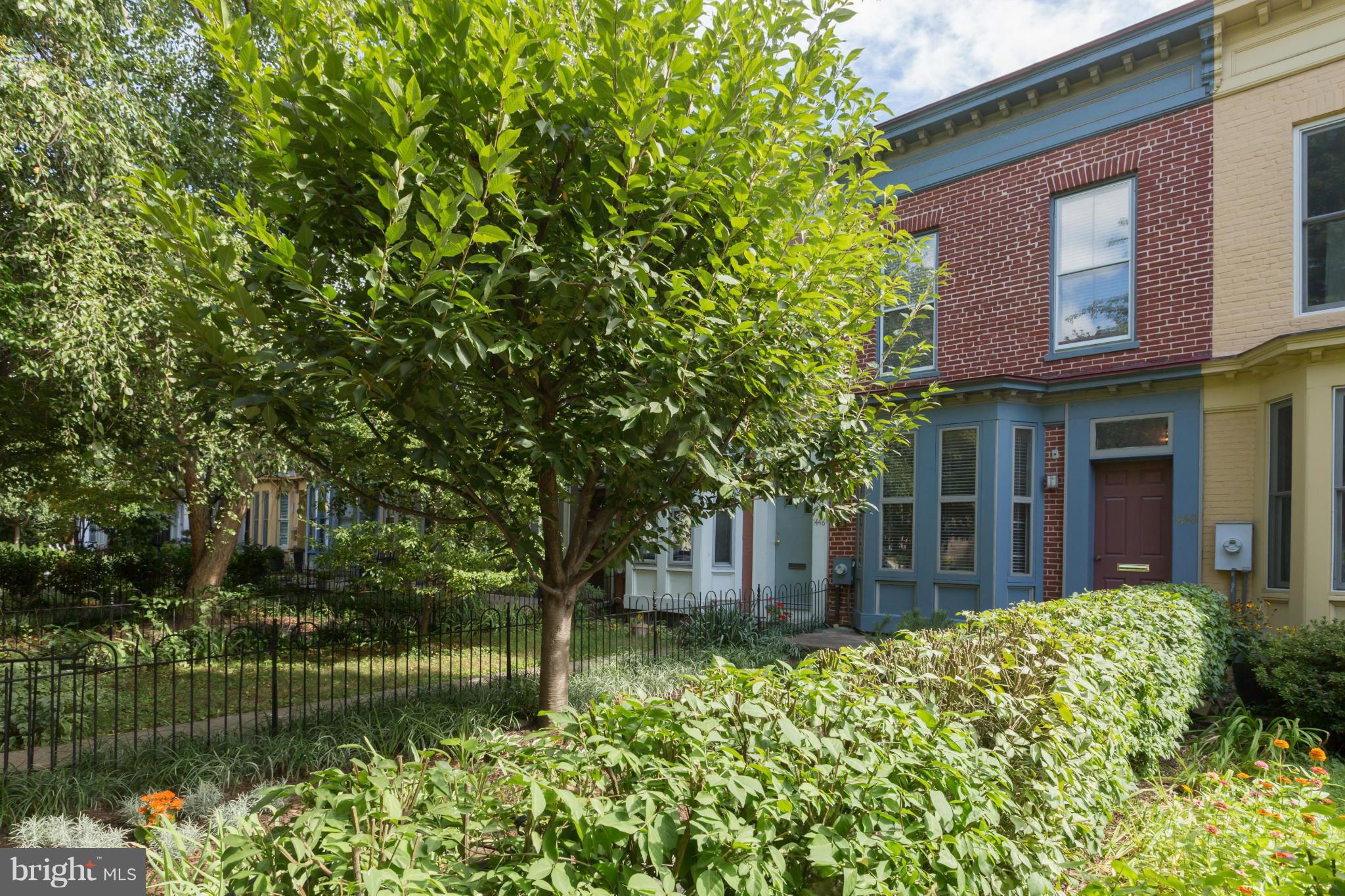 1450 T Street Northwest Washington, DC 20009 - Photo 1 of 14 front view of a house with a yard